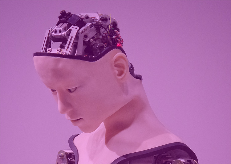 photo of android head with circuitry exposed